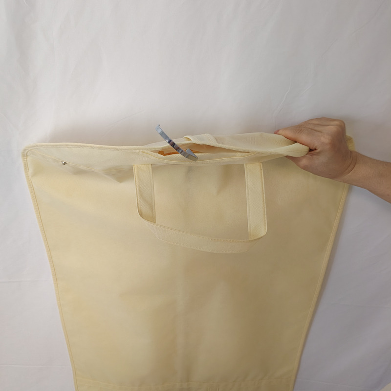 Cream Nonwoven Suit Cover